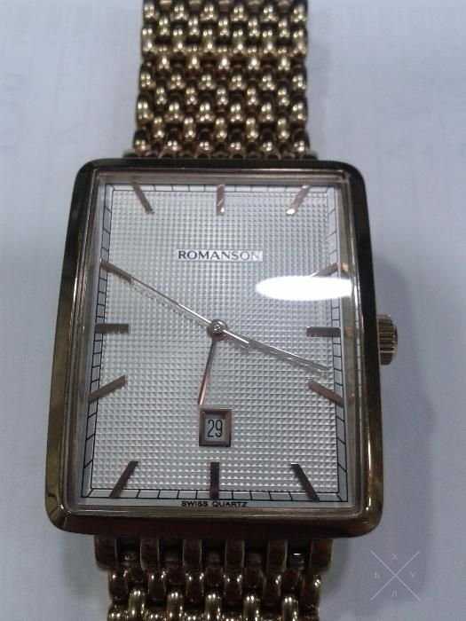 Продам часы ROMANSON DM5163NM