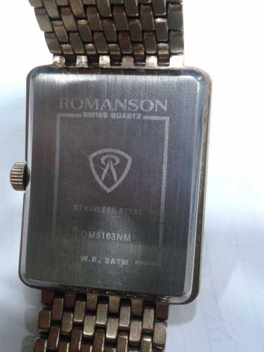 Продам часы ROMANSON DM5163NM