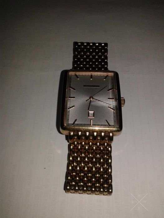 Продам часы ROMANSON DM5163NM
