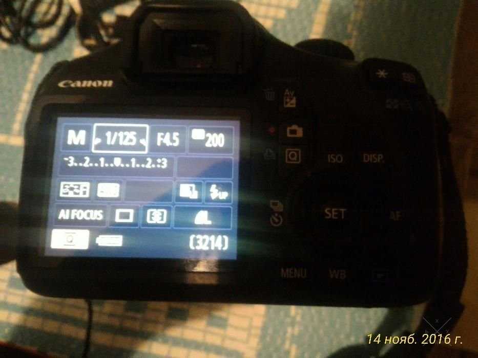 Продам зеркальный фотоаппарат Canon EOS 1100D KIT