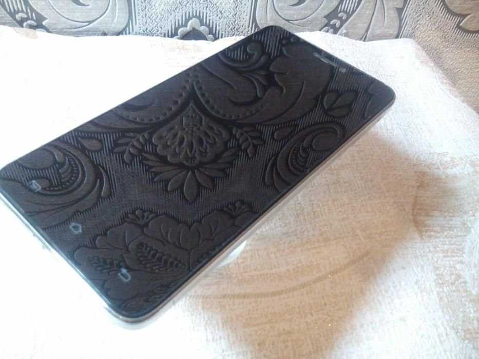 Смартфон Bravis TAU metallic 3G 2 sіm | 5" IPS | 4 яdра по 1,3 ГГц