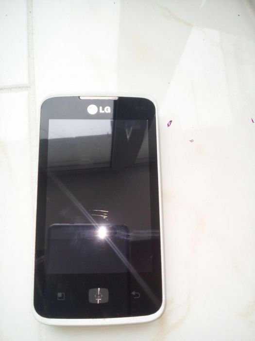 Телефон LG E510