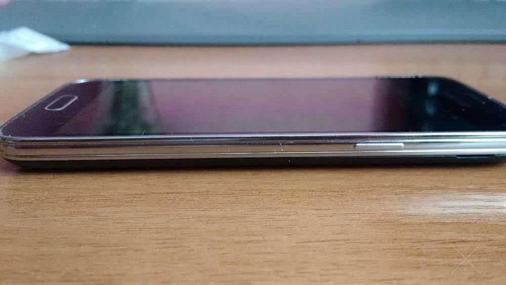 Продам новый телефон Samsung Galaxy S5 mini синего цвета