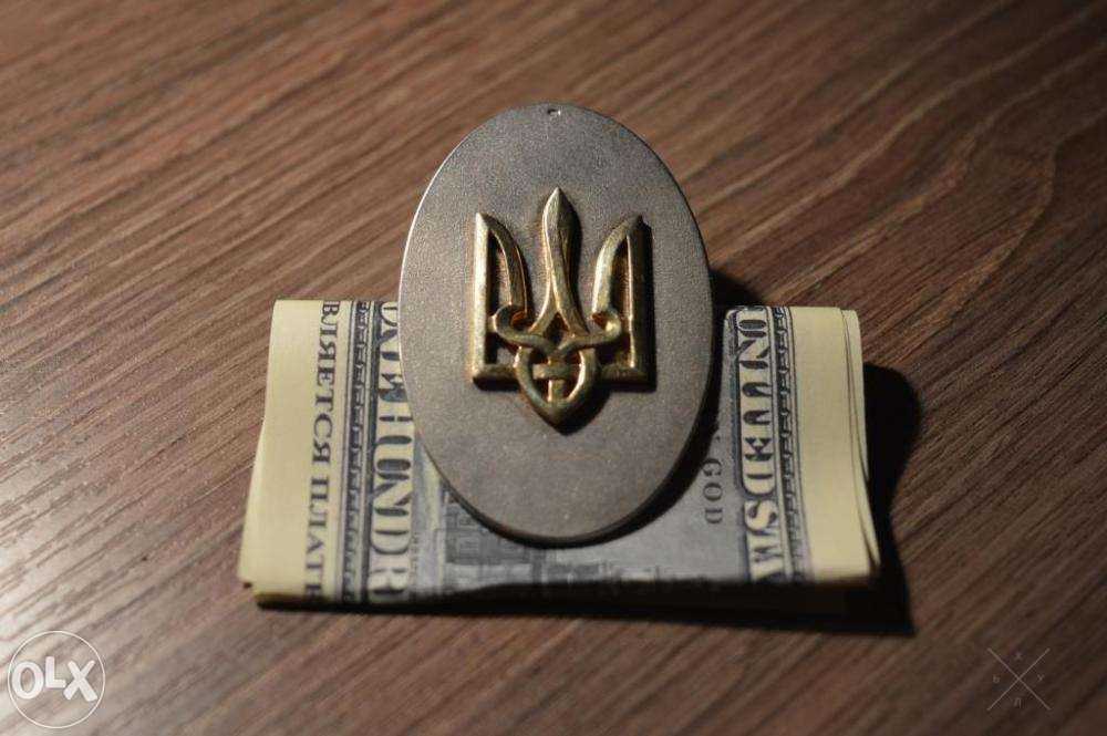 Продам серебряный зажим для денег